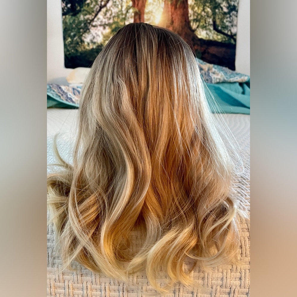 Brand new just past shoulder blonde wig with mesh and accessories